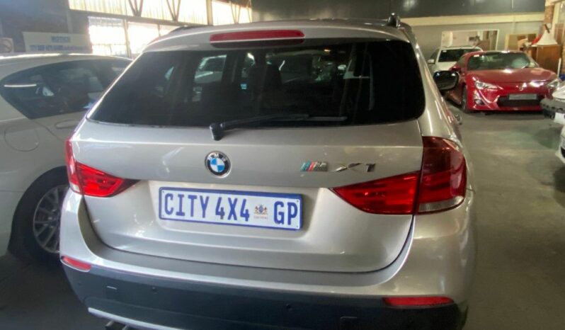 
								2012 BMW X1 full									