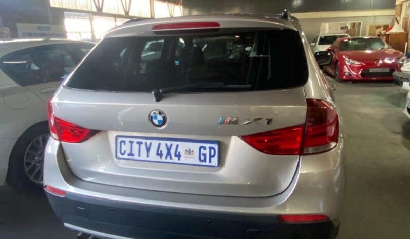 
								2012 BMW X1 full									