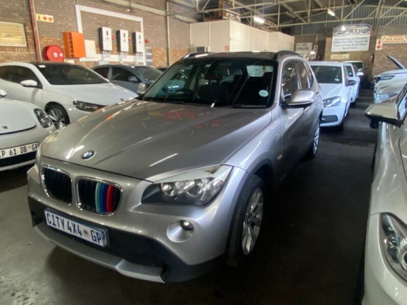 
								2012 BMW X1 full									