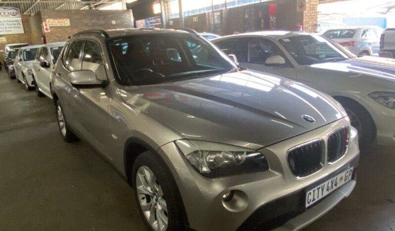 
								2012 BMW X1 full									