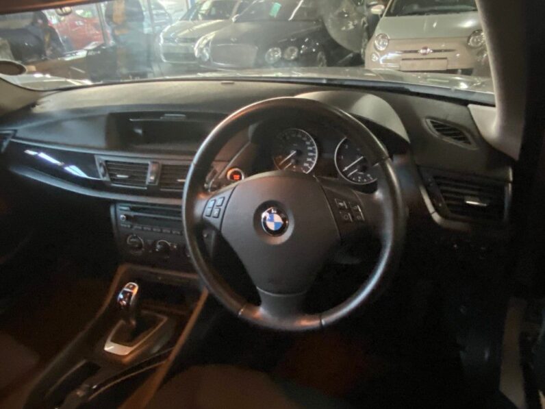 
								2012 BMW X1 full									