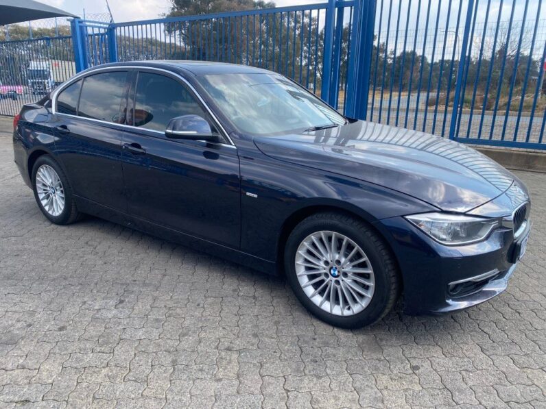 
								13 BMW 320i full									