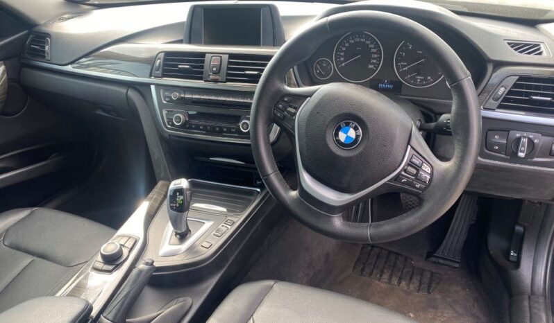 
								13 BMW 320i full									