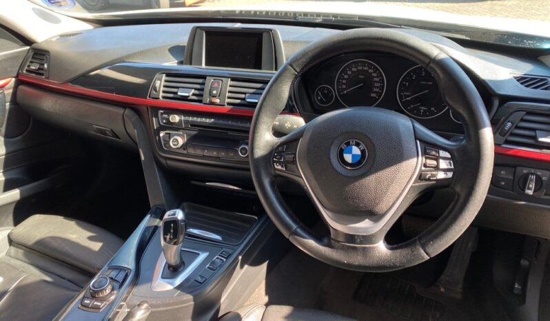 
								2013 BMW 320i full									
