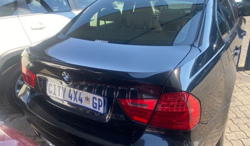 
								2010 BMW 320i full									