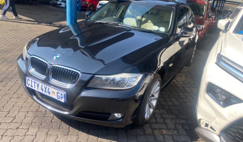 
								2010 BMW 320i full									