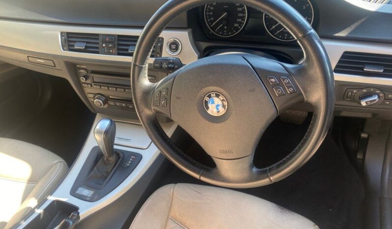 
								2010 BMW 320i full									